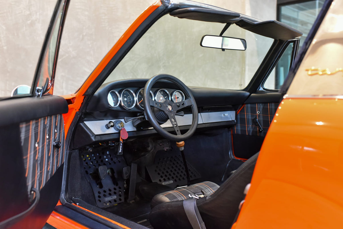 Bexco 001 driver cockpit with MOMO steering wheel