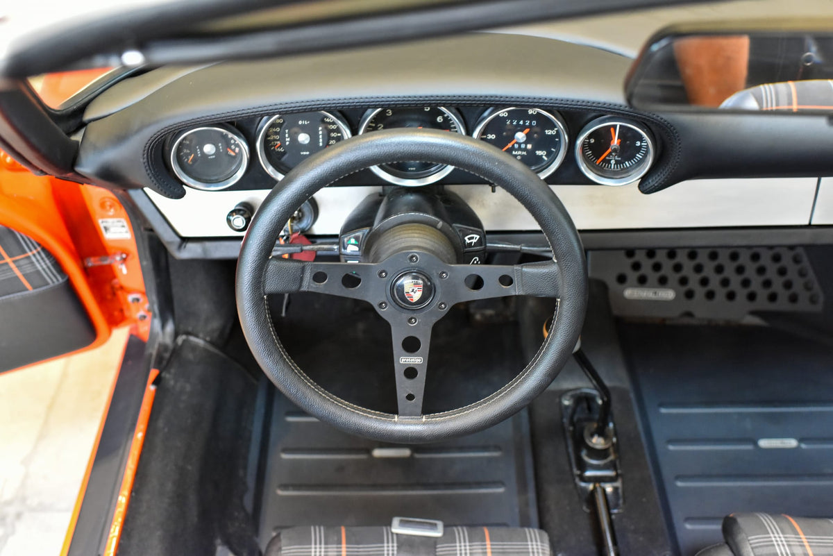MOMO wheel, aluminum dash trim, and VDO gauges